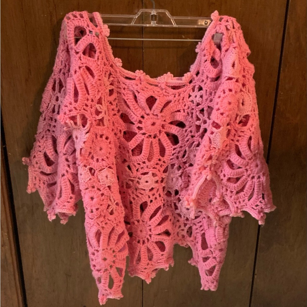 Beautiful pink crocheted sweater with bell sleeves. Size S.